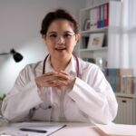 Female doctor making video call